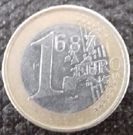 pièce de 1 euro avec 587 gravé dessus, donc 1687